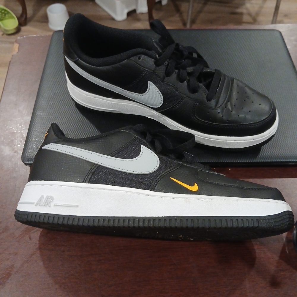 Nike Men's Black and White Sneakers with Orange Accent